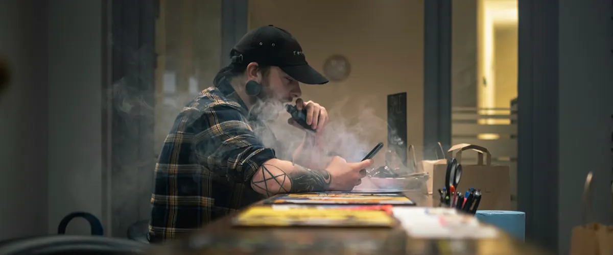 man enjoy his leisure vape